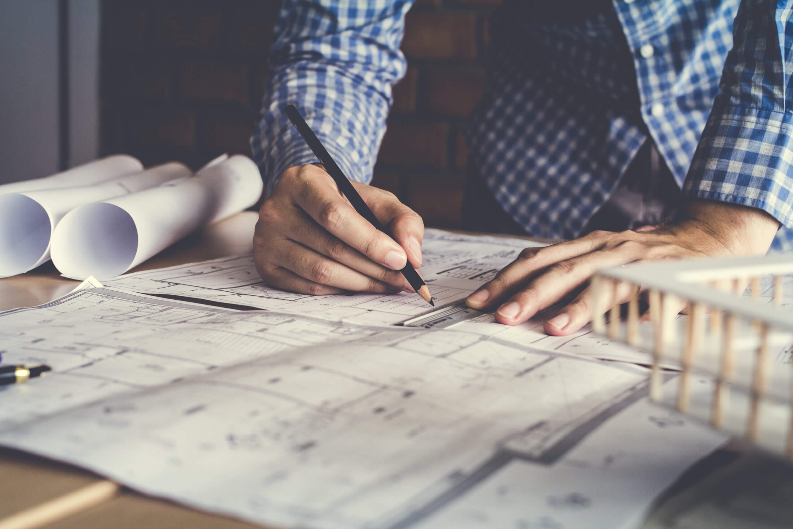 Concept,Architects,,Engineer,Holding,Pen,Pointing,Equipment,Architects,On,The About Us